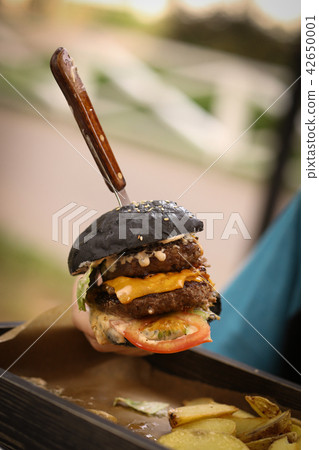 huge hamburger burger with cheese beef tomato huge hamburger burger with cheese beef tomato 42650001