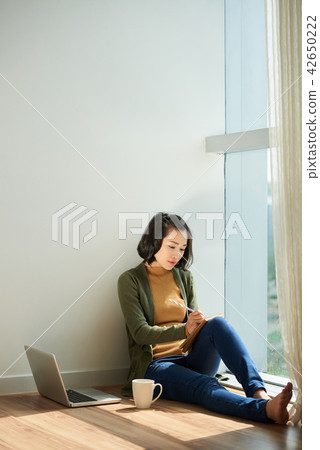 Creative person filling diary Creative person filling diary 42650222