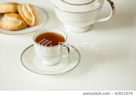 Traditional afternoon tea with scones, porcelain t Traditional afternoon tea with scones, porcelain t 42651074