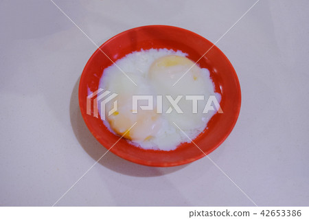 Two soft-boiled eggs in a cup, suitable for eating Two soft-boiled eggs in a cup, suitable for eating 42653386