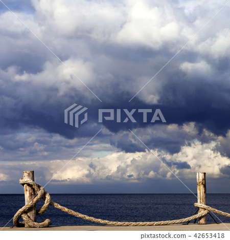 Seafront, sea and cloudy sky before storm 42653418