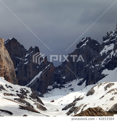 Black and white snowy mountains and sky with cloud Black and white snowy mountains and sky with cloud 42653564