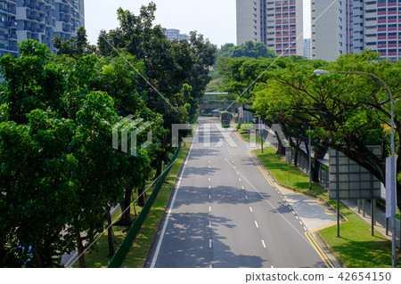 Roads in Singapore are clean, comfortable Roads in Singapore are clean, comfortable 42654150