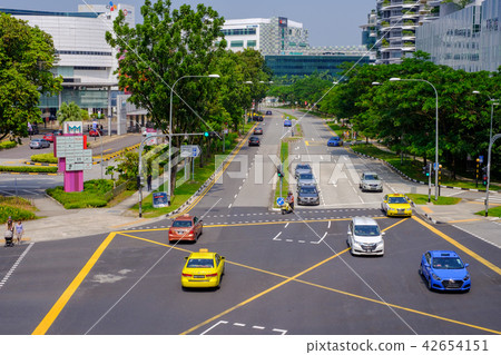 Roads in Singapore are clean, comfortable Roads in Singapore are clean, comfortable 42654151