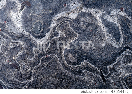 Textured stone surface, creative, strange on stone 42654422