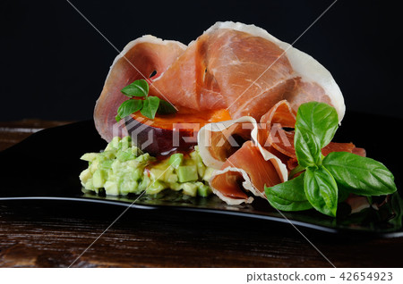 Avocado with apricot and Parma ham Avocado with apricot and Parma ham 42654923