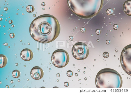 Close up Water drops on glass, orange background, Close up Water drops on glass, orange background, 42655489