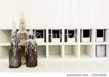 Bottles with a candle Bottles with a candle 42656846