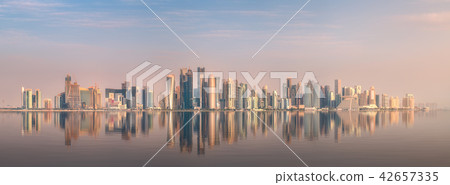 Skyline of West Bay and stony bank Doha, Qatar Skyline of West Bay and stony bank Doha, Qatar 42657335