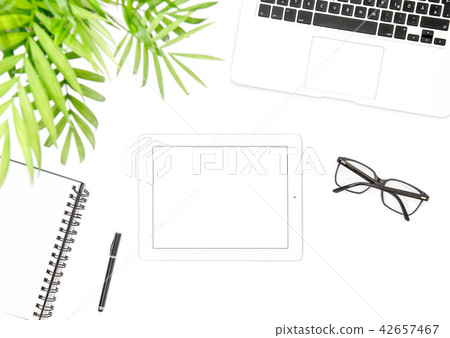 Office desk flat lay Laptop tablet notebook 42657467