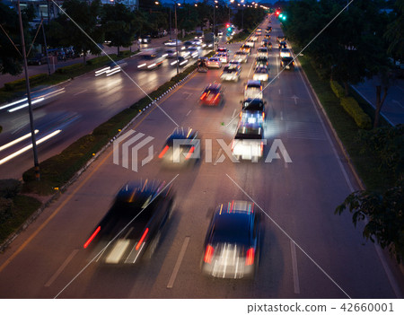 Car traffic at night. Motion blurred blur Car traffic at night. Motion blurred blur 42660001