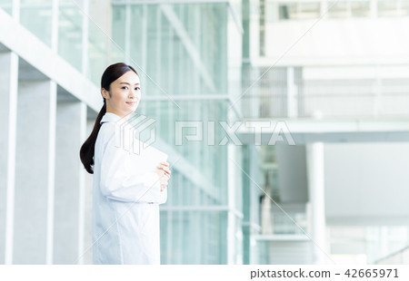 A lady in white A lady in white 42665971