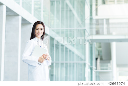 A lady in white A lady in white 42665974