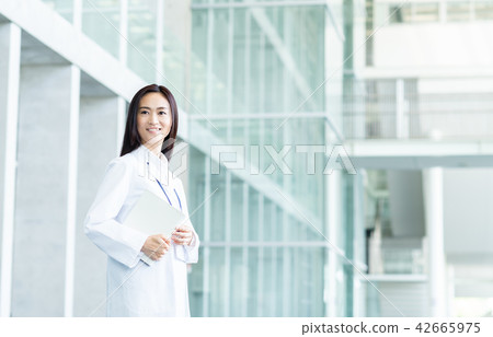 A lady in white A lady in white 42665975