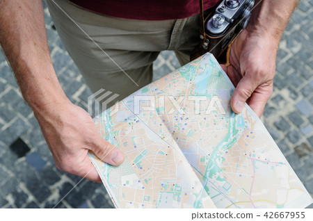 A man with map. A man with map. 42667955