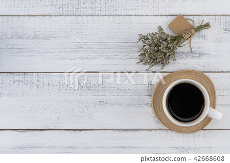 A cup of coffee with caspia bouquet A cup of coffee with caspia bouquet 42668608