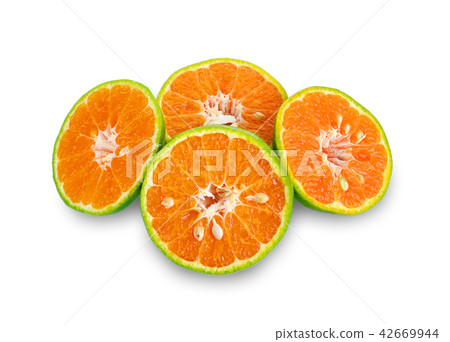green tangerine on white background. green tangerine on white background. 42669944
