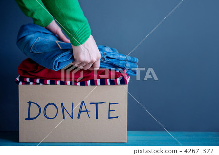 Donation Concept. Used Old Clothes Donation Concept. Used Old Clothes 42671372
