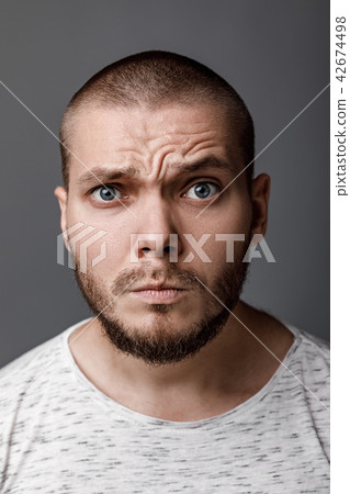 portrait of a young fearful man portrait of a young fearful man 42674498