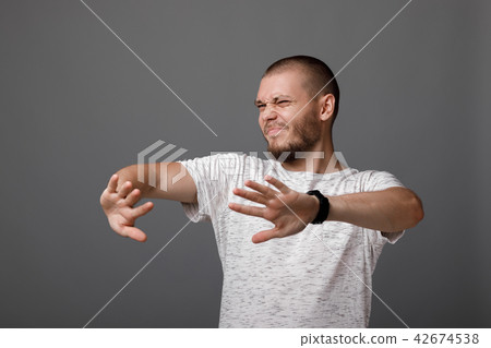 man showing a stop gesture 42674538