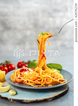 Delicious spaghetti on fork 42676239