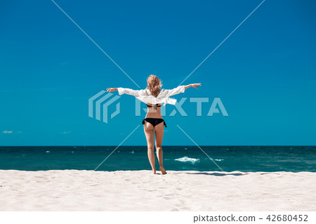 woman on sea beach woman on sea beach 42680452