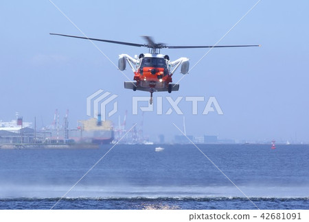 Maritime Self-Defense Force UH-60J rescue helicopter that carries out rescue training at sea 42681091
