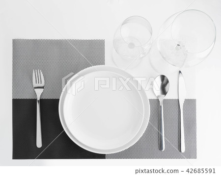 empty dish with spoon and fork empty dish with spoon and fork 42685591