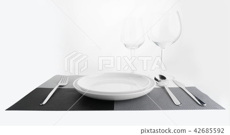 empty dish with  spoon and fork 42685592
