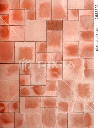 Beige and brown floor tiles close up 42688302