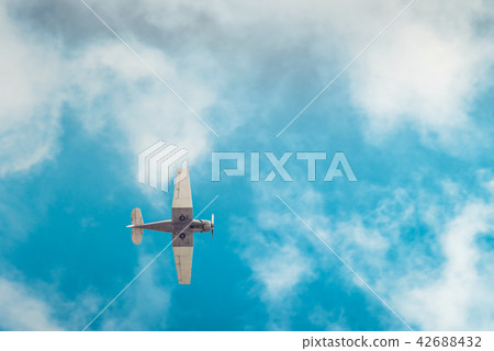 Aerobatic airplane in blue sky Aerobatic airplane in blue sky 42688432