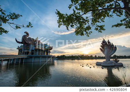 Beautiful sanctuary with Naga statue during sunset Beautiful sanctuary with Naga statue during sunset 42690804