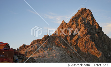 Mountain top of Yubigatake which receives the setting sun 42691844