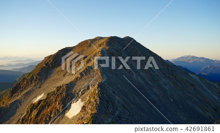 Morning sun hit the great mountain 42691861