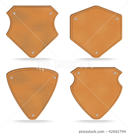 Set of leather tag labels on white 42692794