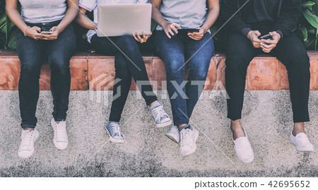 young people being used computer and tablet young people being used computer and tablet 42695652