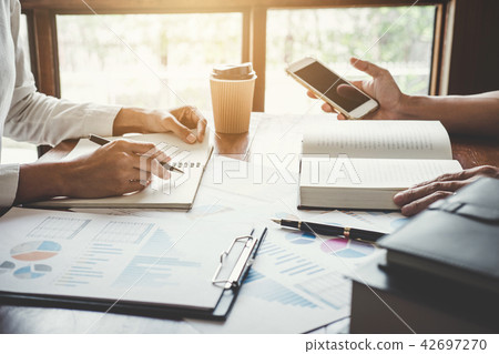 Teamwork process, Business team are meeting and discussing marke 42697270