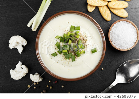 mushroom cream soup on a black background 42699379