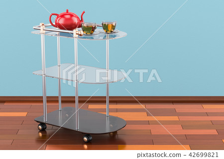 Serving cart with cups of tea and teapot Serving cart with cups of tea and teapot 42699821