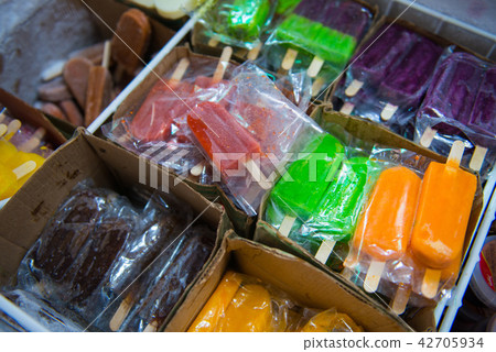 Many flavors of Ice cream in the freezer  42705934