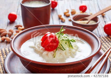kong-guksu - cold korean soup, top view kong-guksu - cold korean soup, top view 42707188