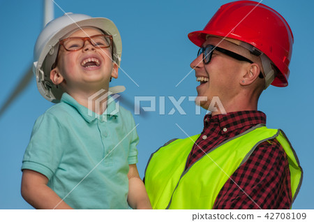 Concept of engineers and windmills Concept of engineers and windmills 42708109