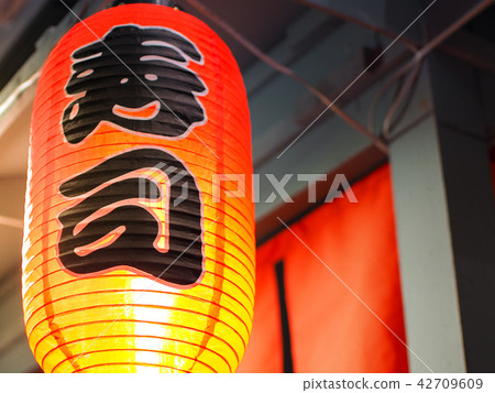 Red Japanese lantern hung in front of Restaurant. Red Japanese lantern hung in front of Restaurant. 42709609