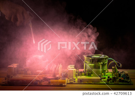 Cleaning computer mainboard using air compressor Cleaning computer mainboard using air compressor 42709613