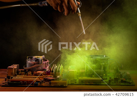 Cleaning computer mainboard using air compressor Cleaning computer mainboard using air compressor 42709615