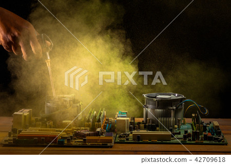 Cleaning computer mainboard using air compressor Cleaning computer mainboard using air compressor 42709618