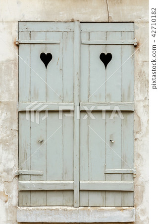 closed wooden shutters closed wooden shutters 42710182