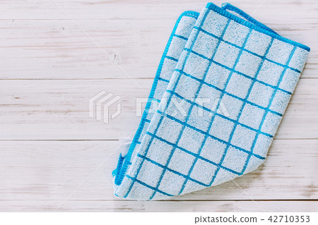 Tablecloth on wooden table 42710353