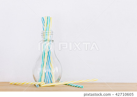 Striped drink straws of different colors Striped drink straws of different colors 42710605