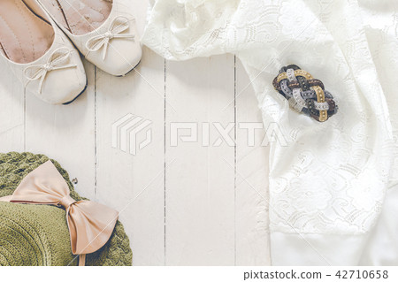 Outfit of casual and woman fashion on wooden Outfit of casual and woman fashion on wooden 42710658